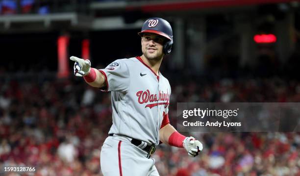 Lane Thomas of the Washington Nationals celebrates after hitting a 2 RBI home run in the 10th inning against the Cincinnati Reds at Great American...