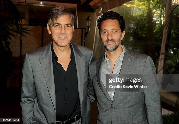 Actor George Clooney and producer Grant Heslov attend the 13th Annual AFI Awards at Four Seasons Los Angeles at Beverly Hills on January 11, 2013 in...