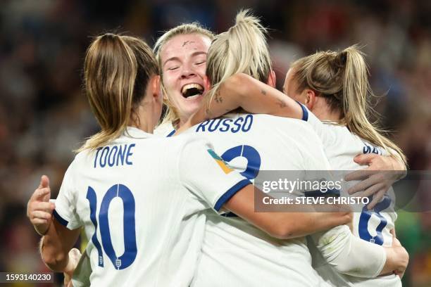 England's forward Alessia Russo celebrates with teammates after scoring a goal during the Australia and New Zealand 2023 Women's World Cup...