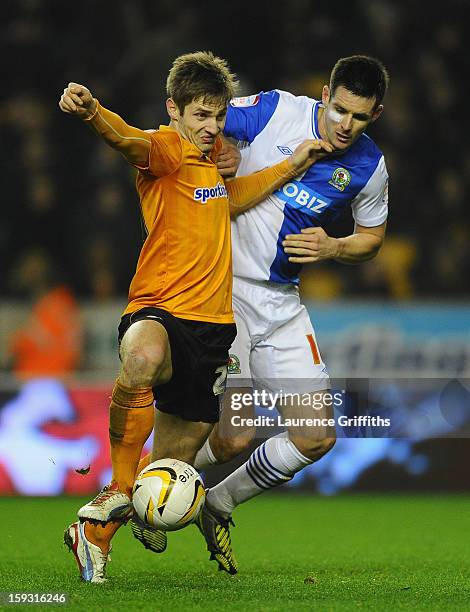 Kevin Doyle of Wolverhapton Wanderers battles with Scott Dann of Blackburn Rovers during the npower Championship match between Wolverhampton...