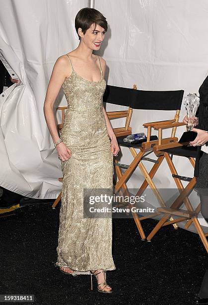 Anne Hathaway poses at the18th Annual Critics' Choice Movie Awards at The Barker Hanger on January 10, 2013 in Santa Monica, California.