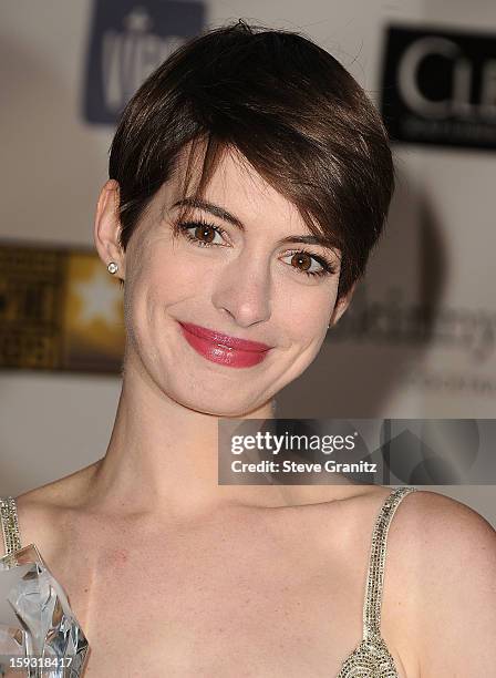 Anne Hathaway poses at the18th Annual Critics' Choice Movie Awards at The Barker Hanger on January 10, 2013 in Santa Monica, California.