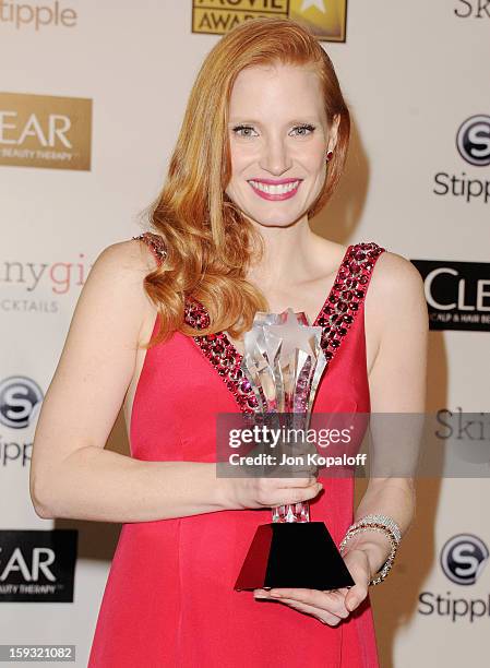 Actress Jessica Chastain poses in the press room at the 18th Annual Critics' Choice Movie Awards at Barker Hangar on January 10, 2013 in Santa...