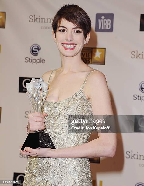 Actress Anne Hathaway poses in the press room at the 18th Annual Critics' Choice Movie Awards at Barker Hangar on January 10, 2013 in Santa Monica,...