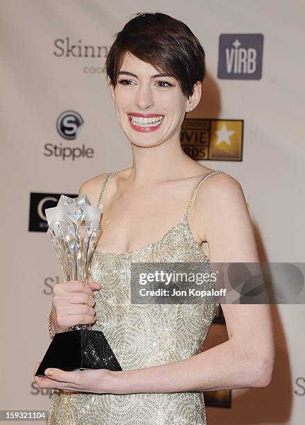 Actress Anne Hathaway poses in the press room at the 18th Annual Critics' Choice Movie Awards at Barker Hangar on January 10, 2013 in Santa Monica,...