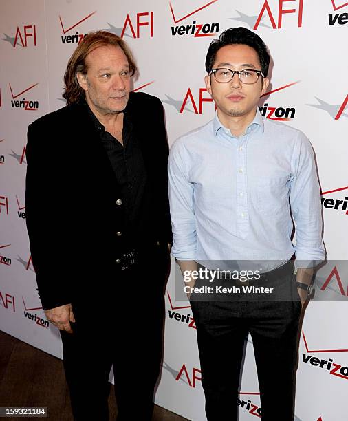 Producer Gregory Nicotero and actor Steven Yeun attend the 13th Annual AFI Awards at Four Seasons Los Angeles at Beverly Hills on January 11, 2013 in...