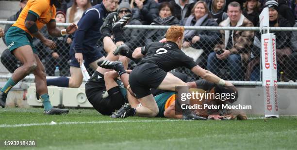 Tom Hooper of Australia drives over to score a try during The Rugby Championship & Bledisloe Cup match between the New Zealand All Blacks and the...