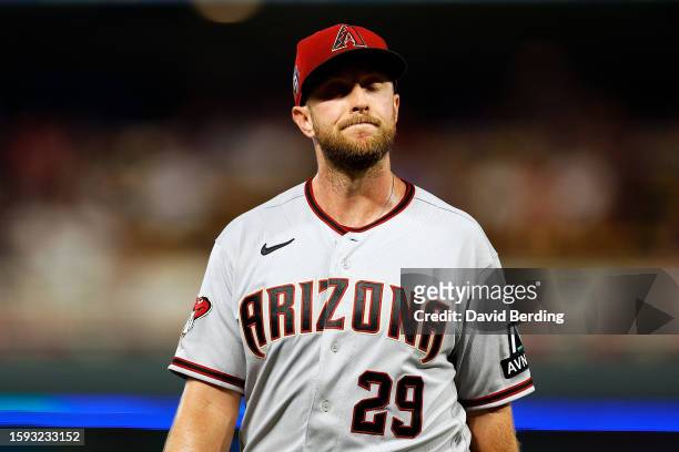 Merrill Kelly of the Arizona Diamondbacks reacts after pitching to the Minnesota Twins in the sixth inning at Target Field on August 04, 2023 in...