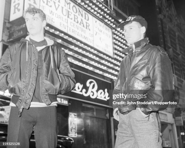 Singer Neil Tennant and keyboard player Chris Lowe of English electronic dance music duo the Pet Shop Boys, outside the Raymond Revuebar in Soho,...