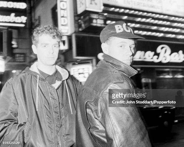 Singer Neil Tennant and keyboard player Chris Lowe of English electronic dance music duo the Pet Shop Boys, outside the Raymond Revuebar in Soho,...