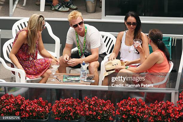 New Zealand tennis player Daniel King-Turner watches Bruno Soares of Brazil and Colin Fleming of Great Britain during the doubles final against Johan...