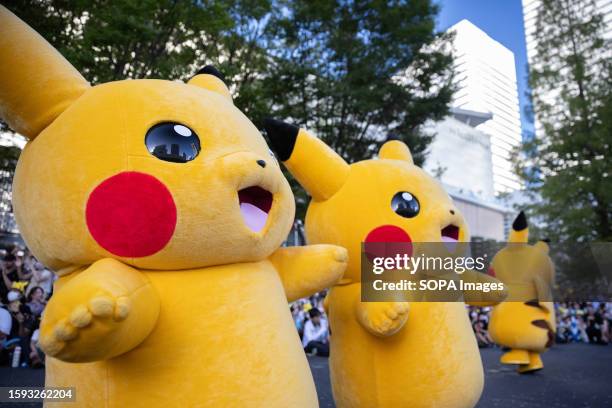 Pikachus walk and dance in front of children and their parents during their parade at Pokemon World Championships 2023 in Minatomirai, Yokohama.