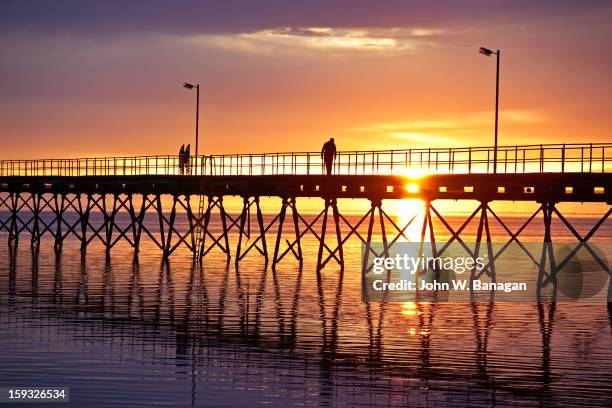 pier at sunset , ceduna, western australia - john piers stock pictures, royalty-free photos & images