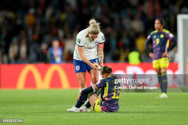 Millie Bright of England comforts Ana Guzman of Colombia after the FIFA Women's World Cup Australia & New Zealand 2023 Quarter Final match between...