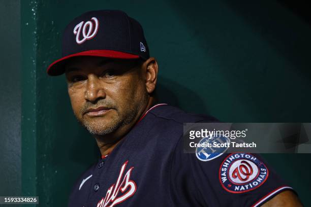 Manager Dave Martinez of the Washington Nationals looks on from the dugout against the Milwaukee Brewers during the seventh inning at Nationals Park...