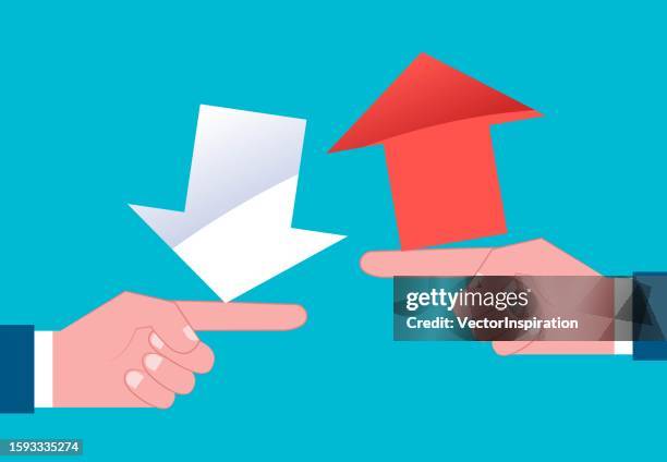 the concept of profit or loss, the upward and downward arrows on the index finger - volatile stock illustrations