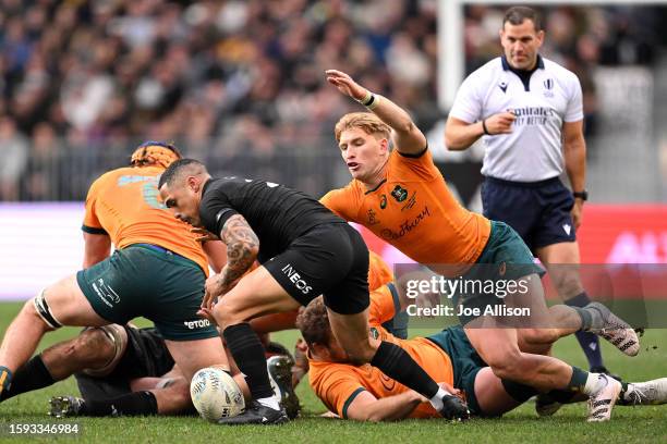 Tate McDermott of Australia puts Aaron Smith of New Zealand under pressure during The Rugby Championship & Bledisloe Cup match between the New...