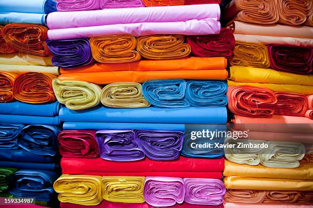 Colourful fabrics on sale for making saris and turbans on April 6, 2009 in a textile factory warehouse in Rajasthan, India.