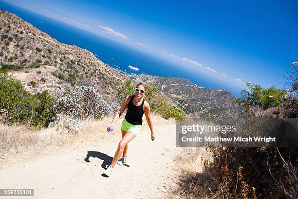 hikers trek the hermit gulch trail - the avalon hollywood stock-fotos und bilder