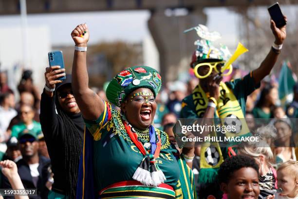 Springbok fans react during the team's departure ceremony for the Rugby World Cup 2023 at OR Tambo International Airport on August 12, 2023.