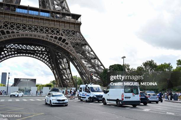 Republican Security Corps officers secure the area in central Paris on August 12 after a security alert prompted the evacuation of three floors of...