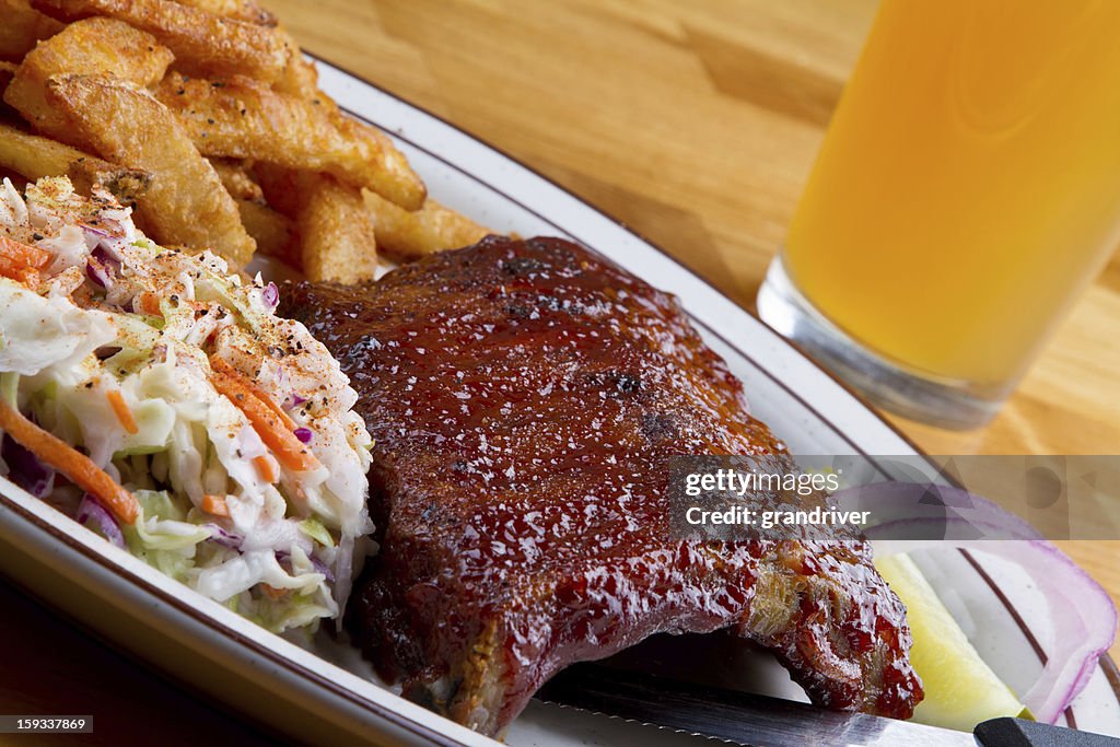 Rib Dinner with French Fries, Cole Slaw and beer