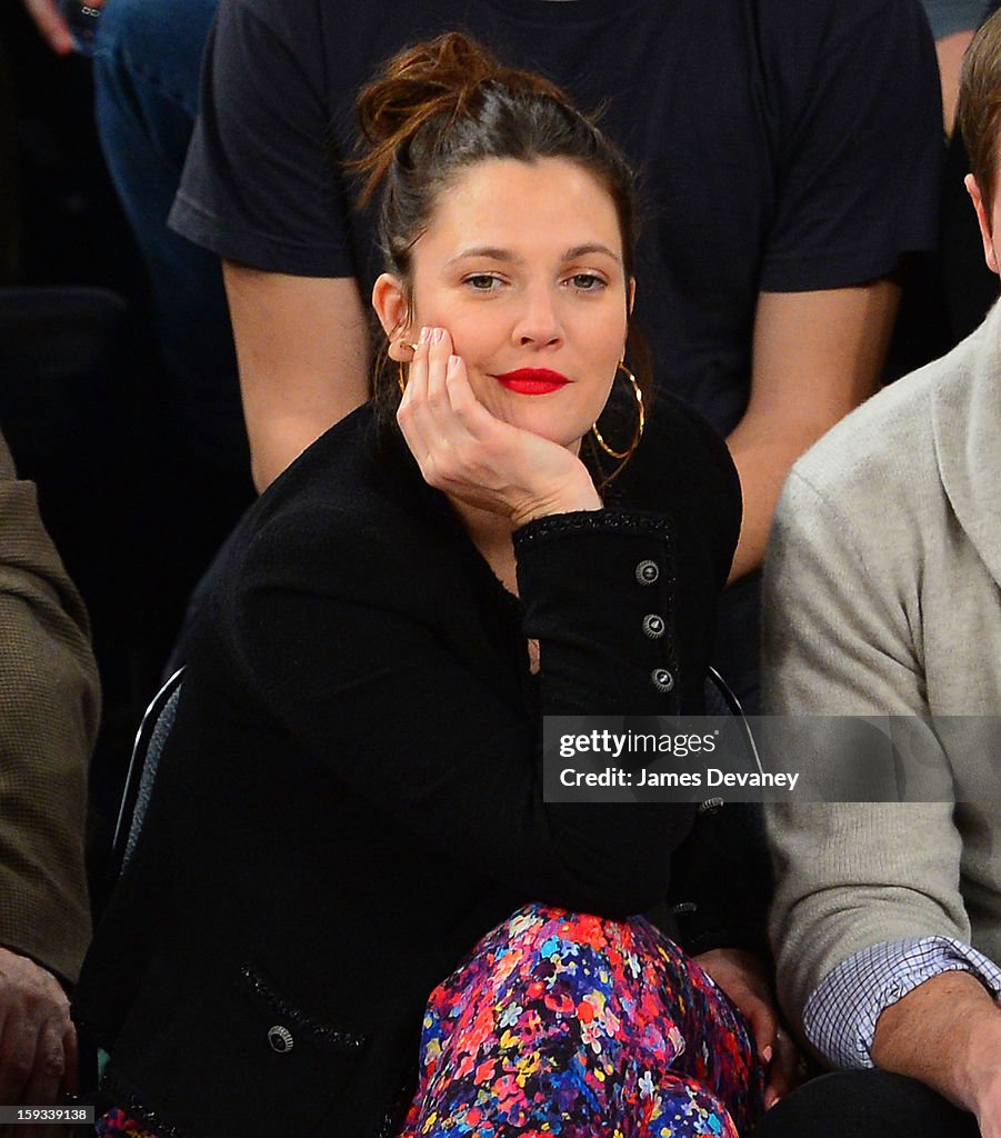 Celebrities Attend The Chicago Bulls Vs New York Knicks Game