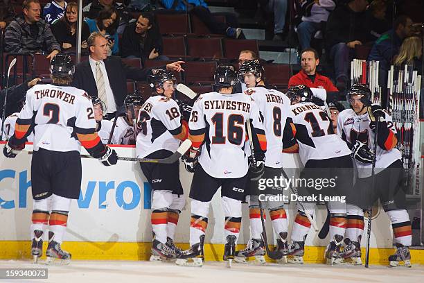 Jake Virtanen of the Calgary Hitmen takes instruction during a break in play against the Vancouver Giants in WHL action on October 2012 at Pacific...