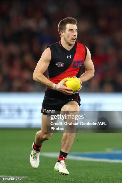 Zach Merrett of the Bombers in action during the round 21 AFL match between Essendon Bombers and West Coast Eagles at Marvel Stadium on August 05,...
