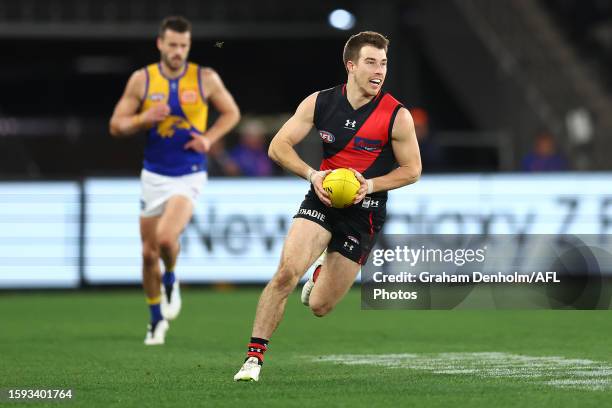 Zach Merrett of the Bombers in action during the round 21 AFL match between Essendon Bombers and West Coast Eagles at Marvel Stadium on August 05,...