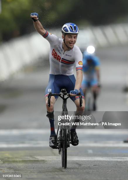 Great Britain's Finlay Graham celebrates after winning the Men's C3 Road Race during day nine of the 2023 UCI Cycling World Championships in...
