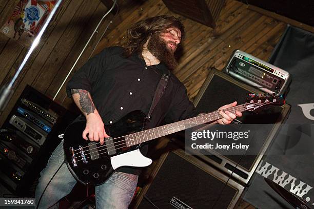 Bassist Jason McCash of The Gates Of Slumber performs at Indy's Jukebox on January 11, 2013 in Indianapolis, Indiana.