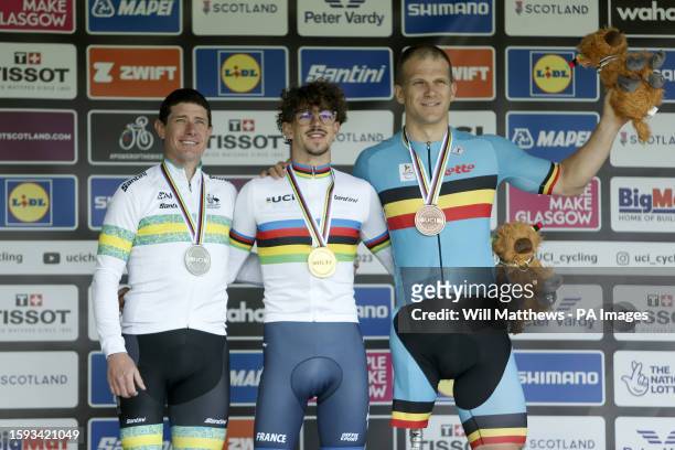 France's Alexandre Leaute poses with his medal after winning the Men's C2 Road Race, alongside Australia's Darren Hicks with silver and Belgium's...