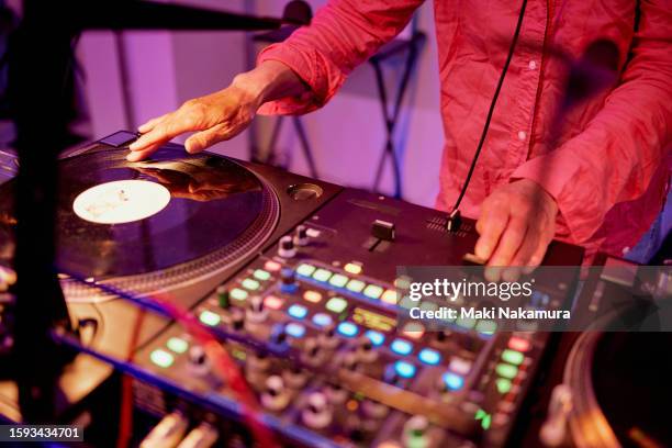 senior female dj hands mixing disco sounds - dance music stock pictures, royalty-free photos & images