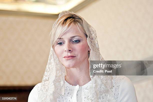 Princess Charlene of Monaco meets Pope Benedict XVI during a private audience at Vatican on January 12, 2013 in Vatican City, Vatican.