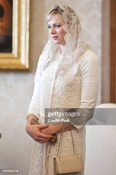 Princess Charlene of Monaco meets Pope Benedict XVI during a private audience at Vatican on January 12, 2013 in Vatican City, Vatican.