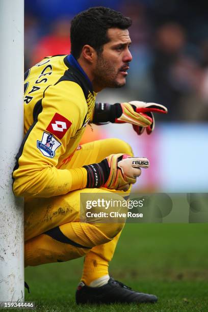 Julio Cesar the Queens Park Rangers goalkeeper shouts instructions to his defence during the Barclays Premier League match between Queens Park...