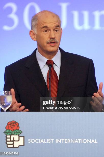 President of the Socialist International, George Papandreou speaks during the 23rd Congress of the Socialist International at the Lagonissi Grand...