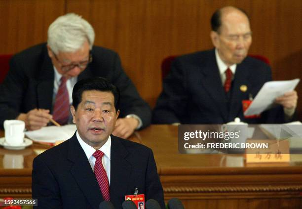 Jia Qinglin, Chairman of the Chinese People's Political Consultative Conference , speaks during the closing session 14 March 2003 at the Great Hall...