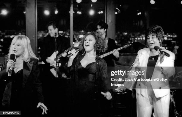 British singer Marianne Faithfull with American singers Darlene Love and Merry Clayton as they perform as part of the '20th Century Pop' concert at...