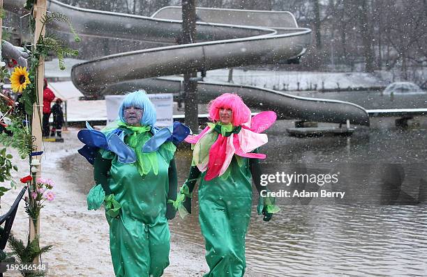 Ice swimming enthusiasts head to the cold waters of Orankesee lake during the 'Winter Swimming in Berlin' event on January 12, 2013 in Berlin,...
