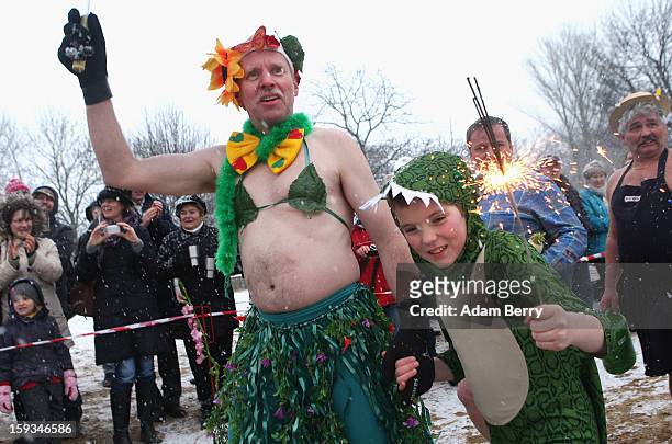 Ice swimming enthusiasts head to the cold waters of Orankesee lake during the 'Winter Swimming in Berlin' event on January 12, 2013 in Berlin,...