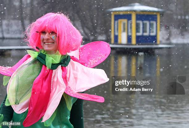 An ice swimming enthusiast prepares to head into the cold waters of Orankesee lake during the 'Winter Swimming in Berlin' event on January 12, 2013...