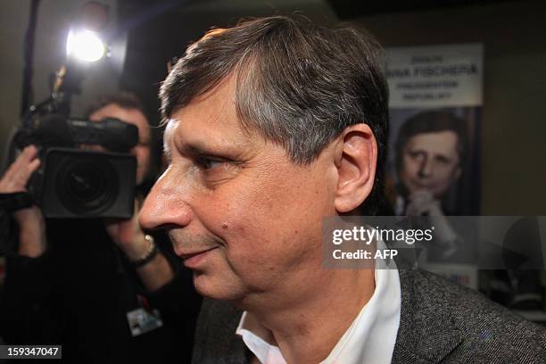 Jan Fischer is pictuerd as the results of the first round of presidential elections are being counted on January 12, 2013 in Prague. Former...