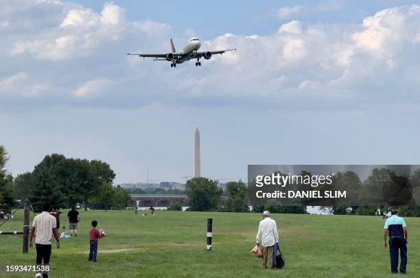 Delta Airlines plane approaches to land at Ronald Reagan Washington National Airport in Arlington Virginia, on August 11 across from Washington, DC,...