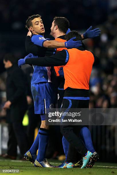 Franco Di Santo of Wigan is congratulated by teammates after scoring the goal to level the scores at 1-1 during the Barclays Premier League match...