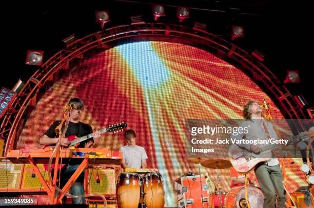 American rock musician Wayne Coyne and his bandmates in the Flaming Lips at a Benefit on Central Park's SummerStage, New York, New York, July 26,...