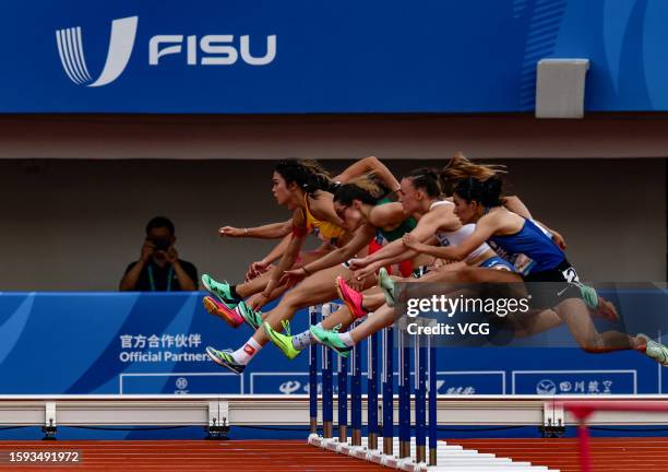 Wu Yanni of Team China competes in the Athletics - Women's 100m Hurdles Final on day 7 of 31st FISU Summer World University Games at Shuangliu Sports...