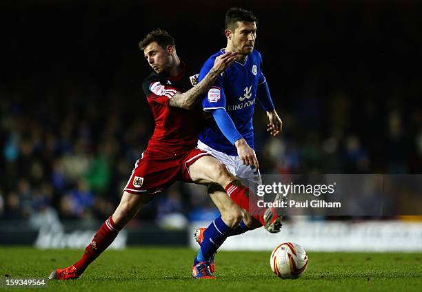 Paul Anderson of Bristol City battles for the ball with David Nugent of Leicester City during the npower Championship match between Bristol City and...