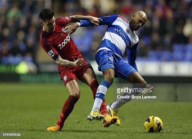 Liam Ridgewell of West Bromwich Albion battles with Jimmy Kebe of Reading during the Barclays Premier League match between Reading and West Bromwich...